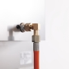 Raccord coudé 90° pour gaz propane